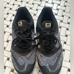 Nike Black and Gray Athletic Shoes with Sleek Design